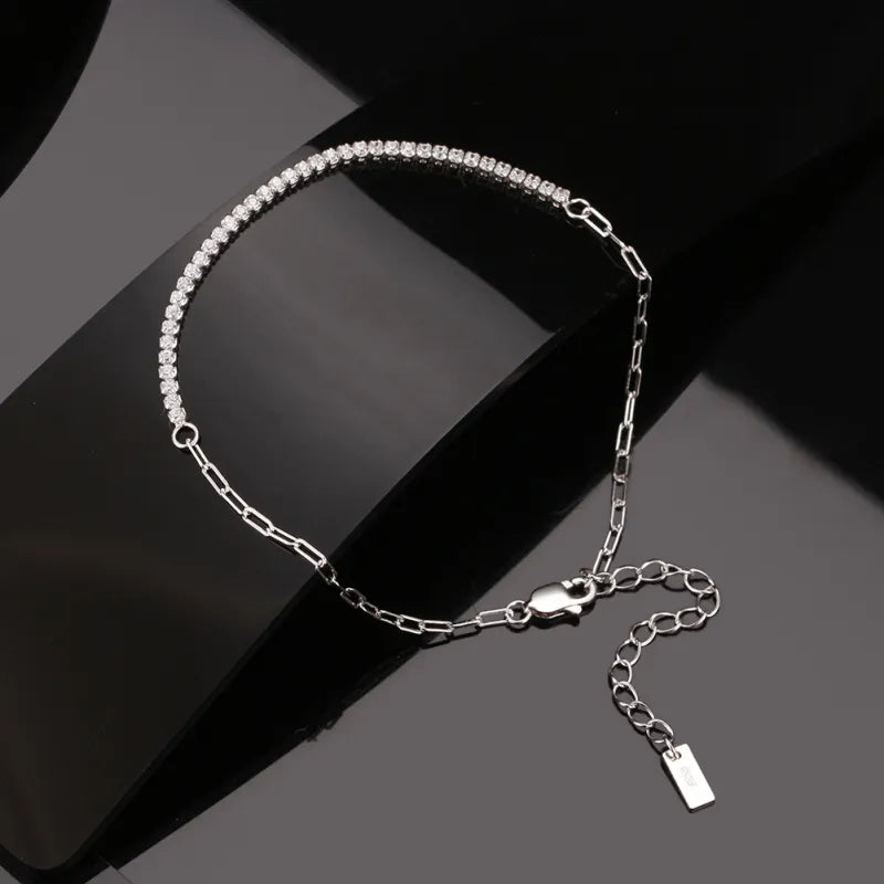 Elysia Bracelet in sterling silver with 4A zircon inlay. Elegant, adjustable design for timeless beauty and versatile sophistication.