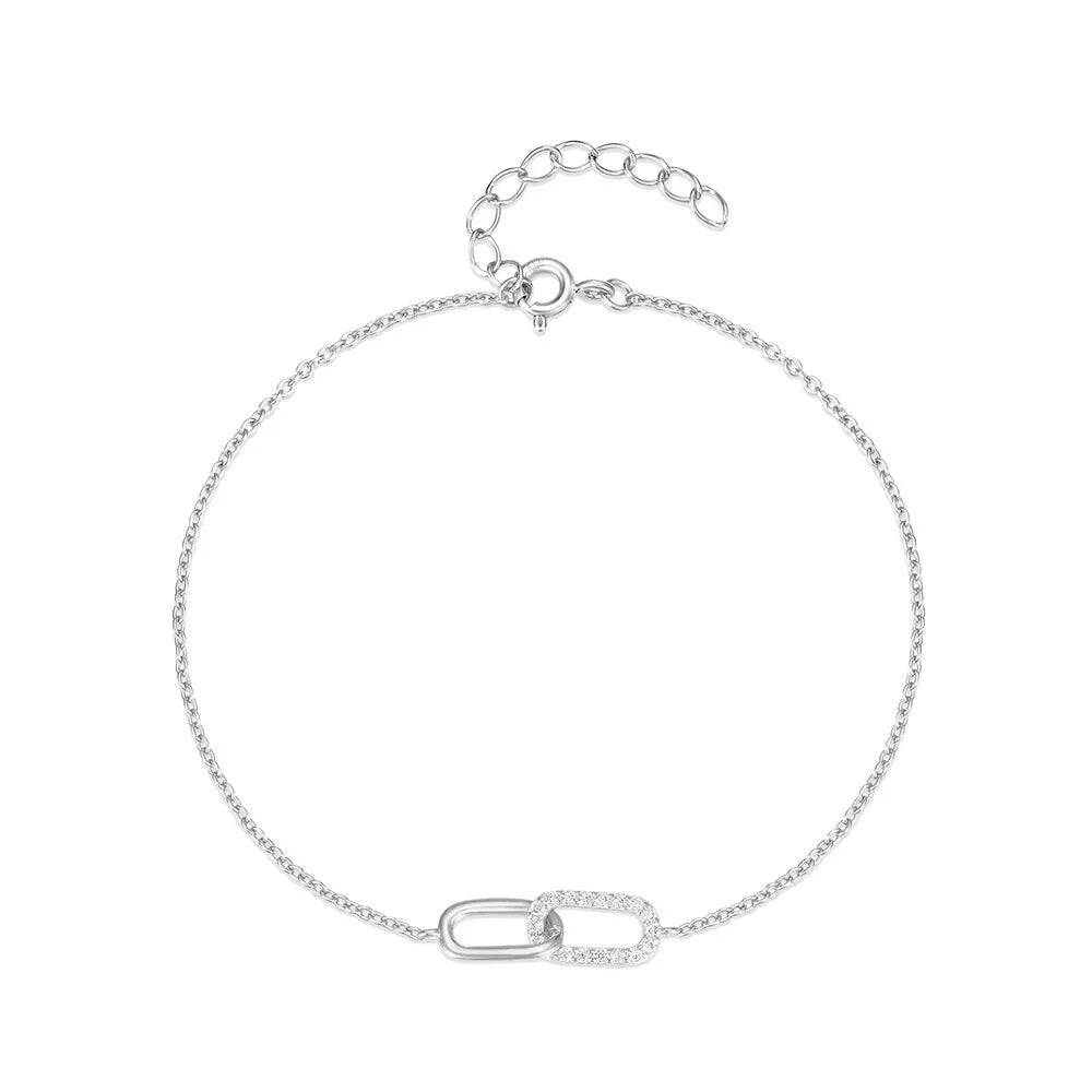 Eos Link Bracelet in 925 Sterling Silver with opal stone and 18K gold plating. Elegant infinity design with adjustable chain for a perfect fit.
